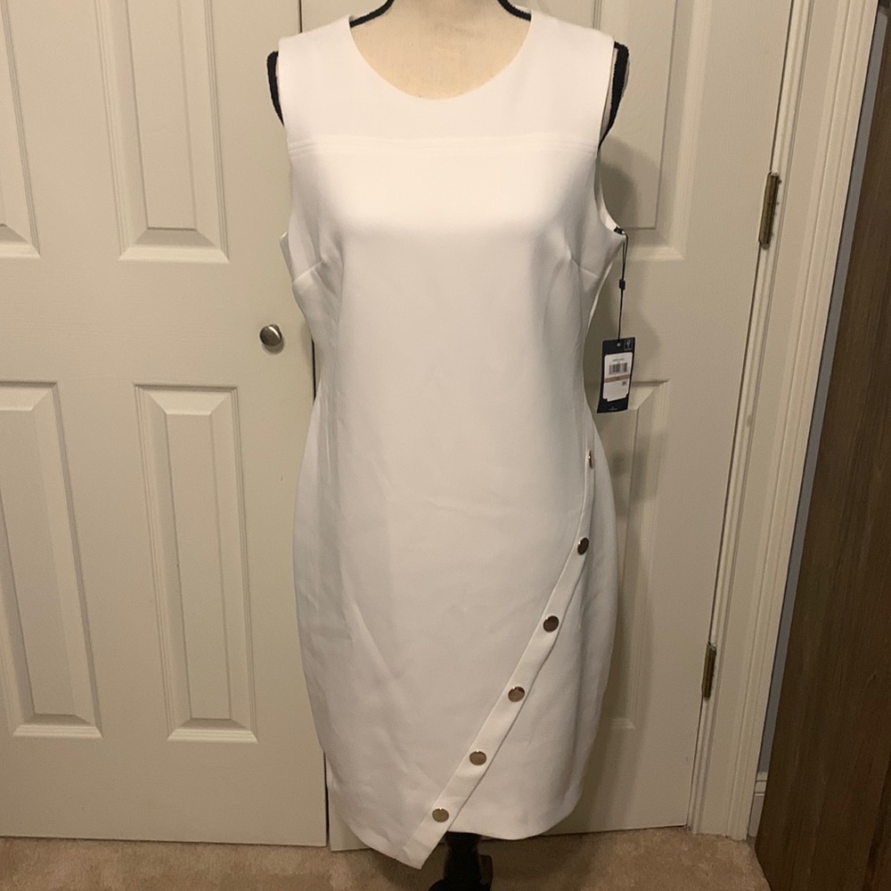 Sleeveless White Sheath Dress with Asymmetric Button Detail
